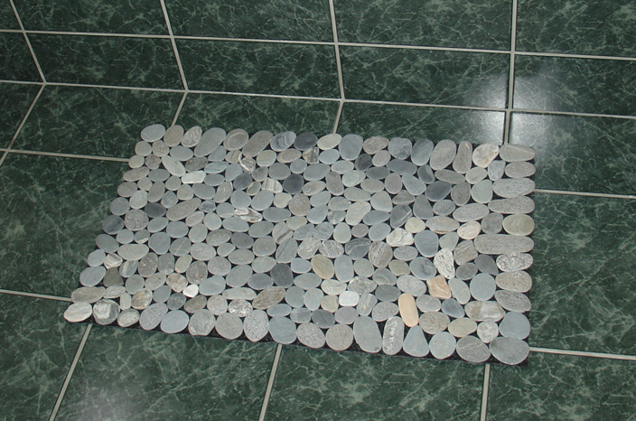 Small stone floor mat